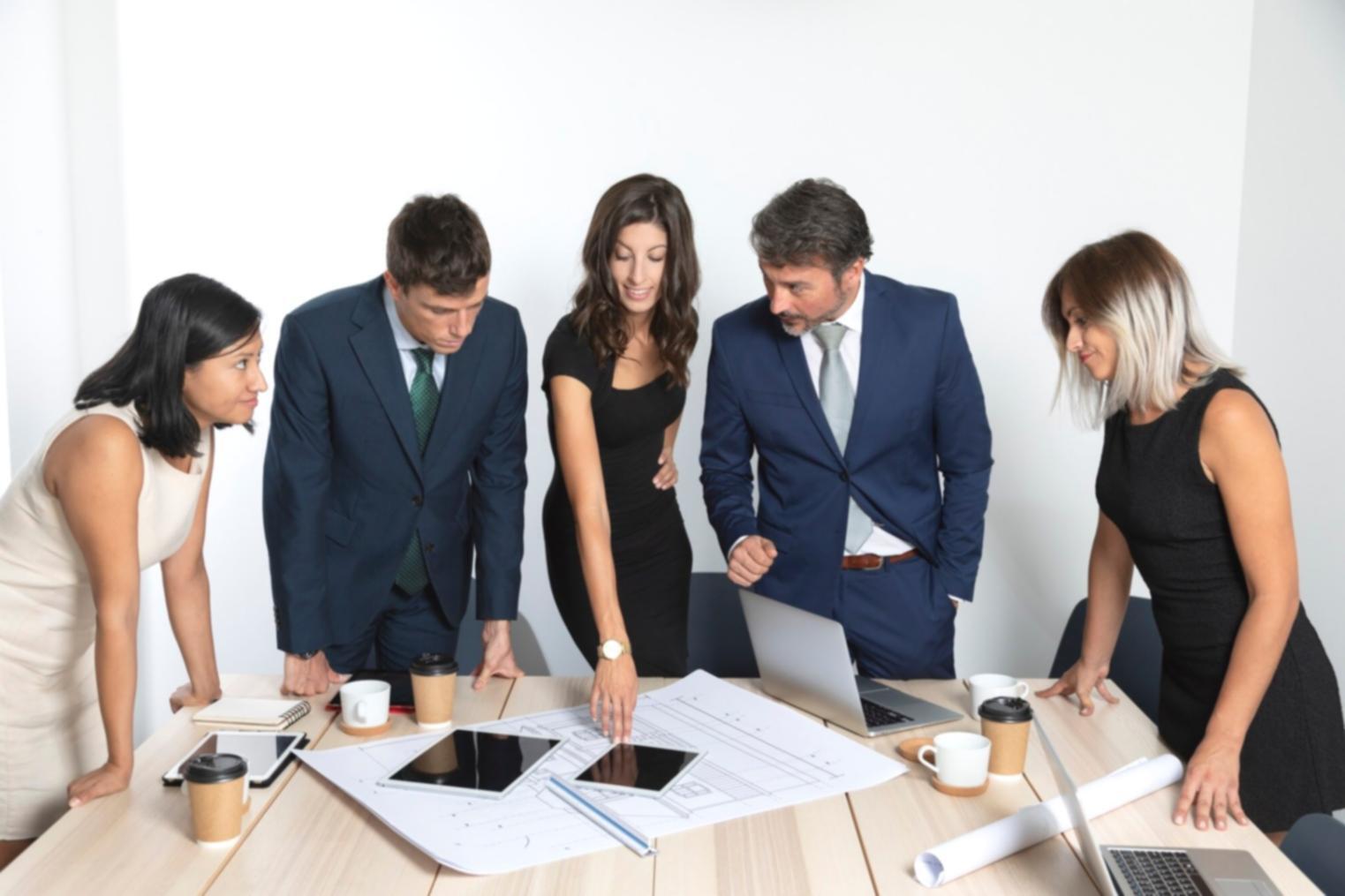 Magnetrix workshop session with founders reviewing fundraising materials